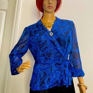 Cute evening wear blouse.  Large, sheer 3/4 sleeves. Sales are final. Worn once